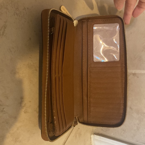 Michael Kors large wallet - and wristlet - tan. 8 in by 4 in - Picture 2 of 5